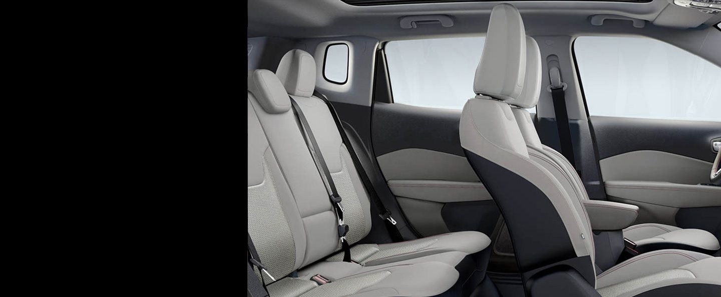 A close-up of the front seats in the 2021 Jeep Compass.